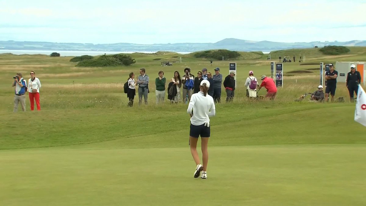 When you're trying to putt, but some playful dogs in the background have other ideas ๐