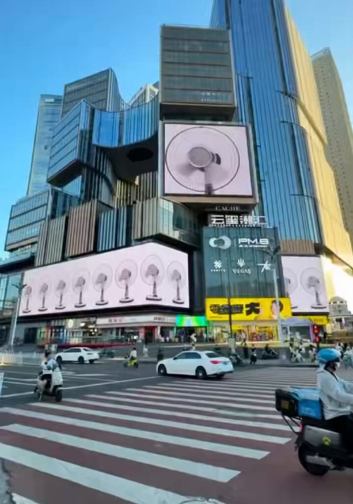 Chinese people are trolling European people by showing air conditioners and cooling fans on digital billboards and posting the videos on social media as much of Europe faces an intense heat wave.