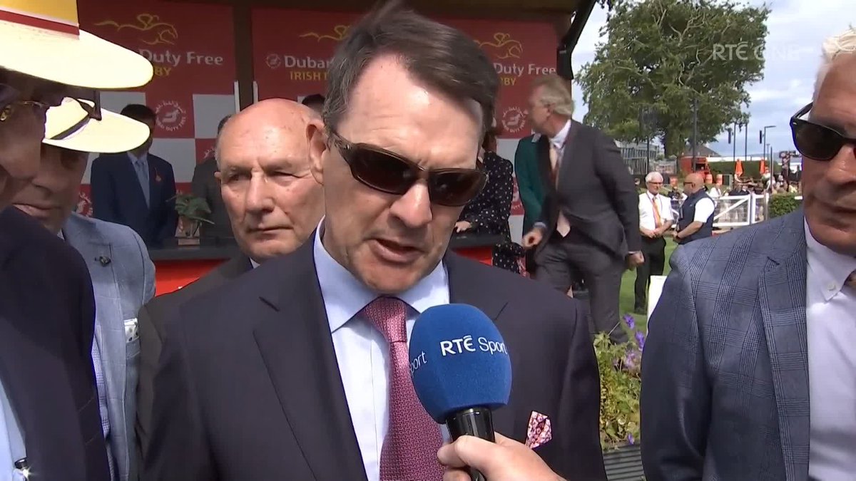 John Magnier and Aidan O'Brien react to Benvenuto Cellini winning the Irish Derby.