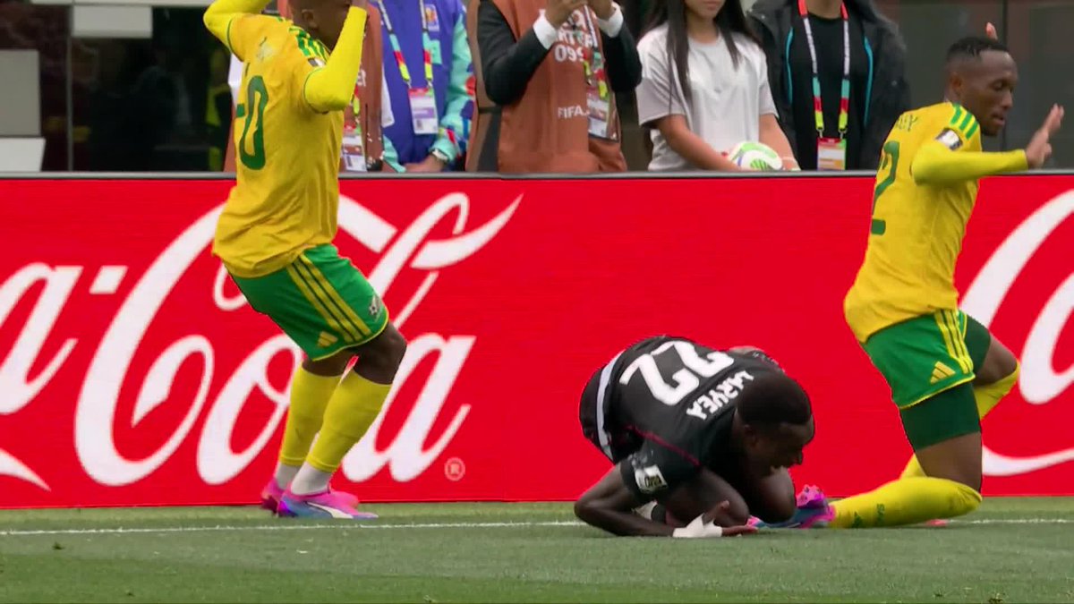 Canada's bench reacts to the non-call on Richie Laryea. #FIFAWorldCup