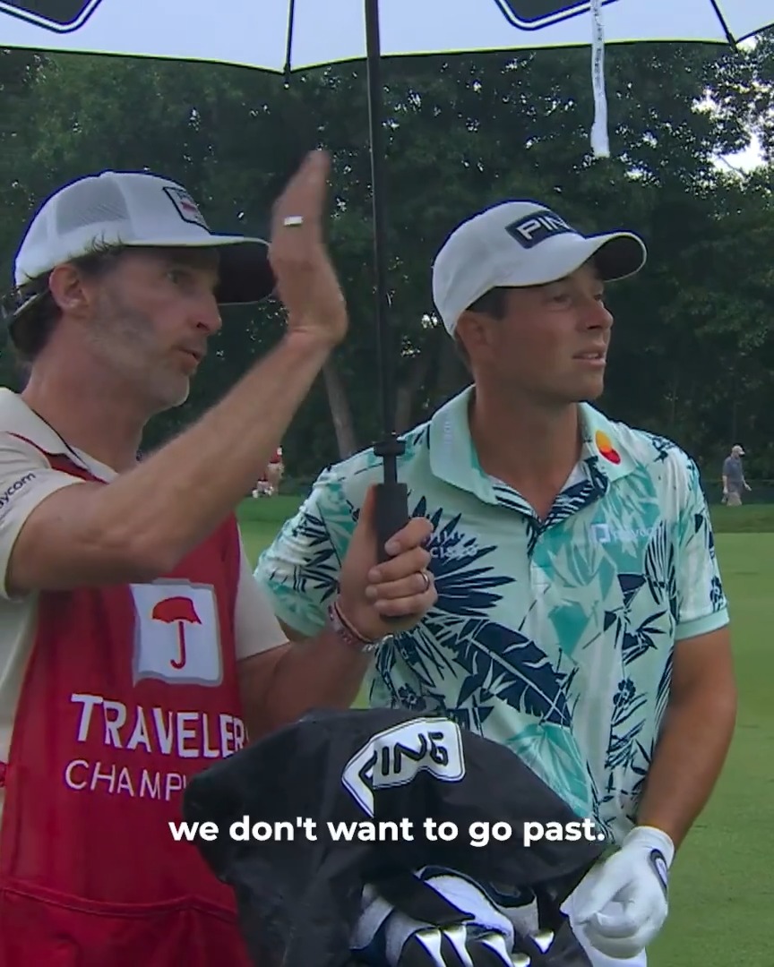 Battling the elements to make a better decision. Viktor Hovland and his caddie talk through their options to make birdie TravelersChamp. (Presented by Aon)