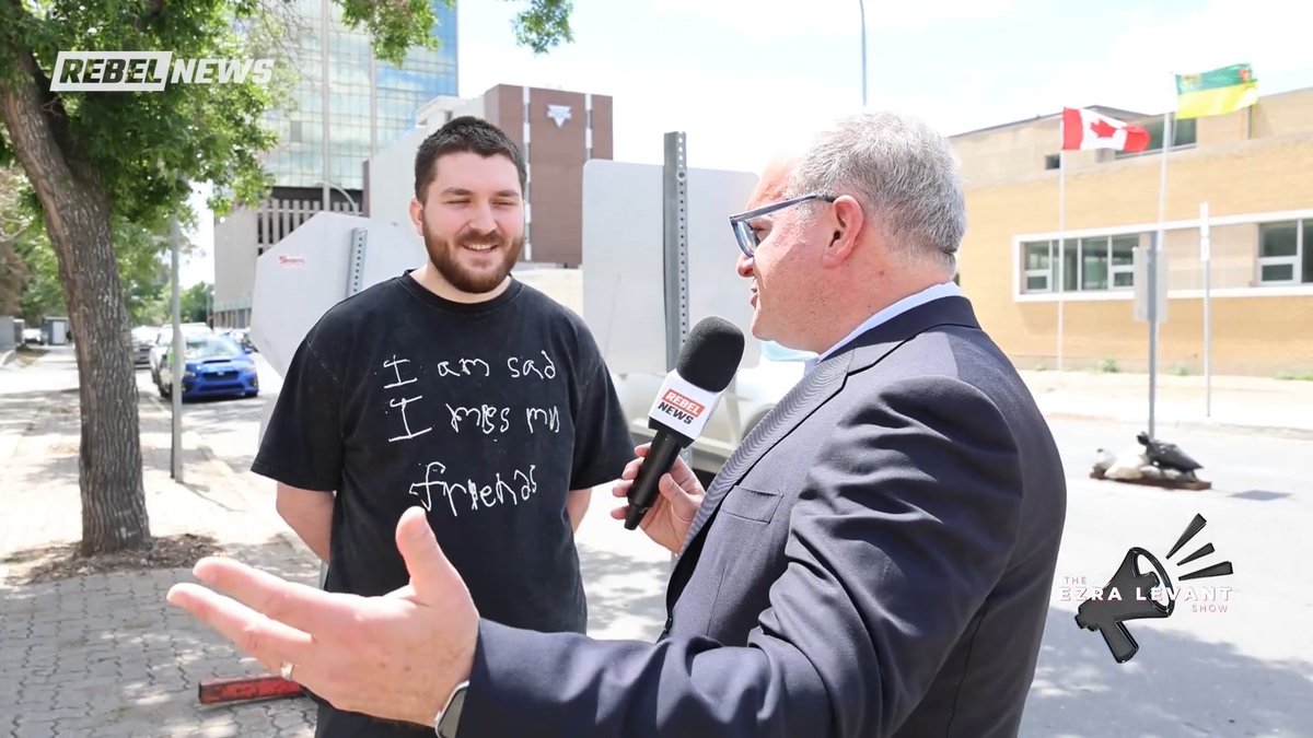 Outside the downtown Regina mosque that blares the Islamic call to prayer, @EzraLevant debated an Albanian Muslim man about the Quran's negative depiction of Jews. After the discussion, the man declined to shake hands. "That's a very weird ending," remarked Ezra.