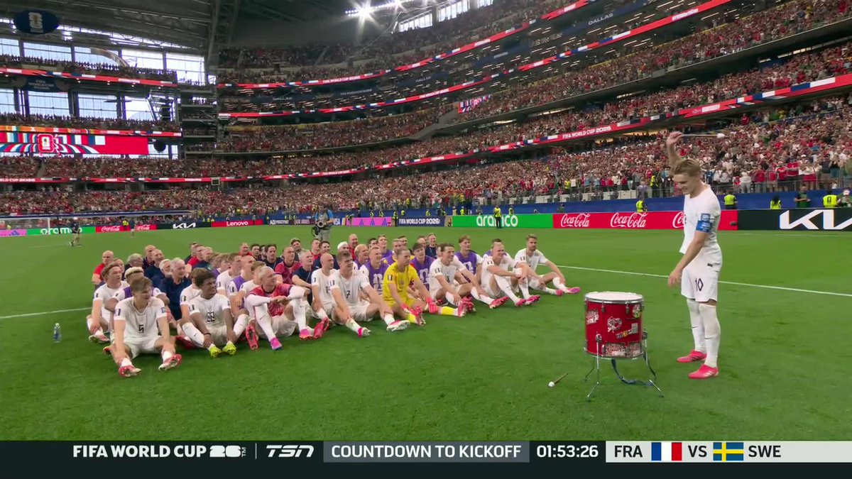 Martin Ødegaard leads Norway fans in the Viking Row after the win #FIFAWorldCup