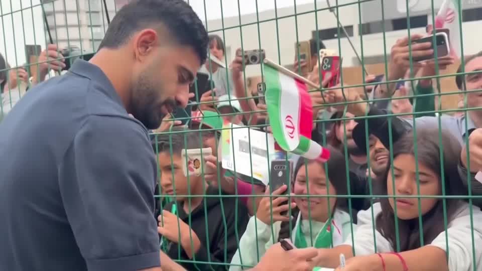Mexican fans gathered in Tijuana to see off Iran's national soccer team, cheering players and collecting autographs before the squad left the city after its elimination from the World Cup tournament