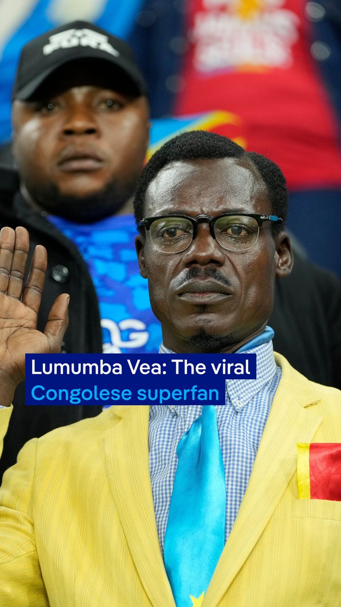 DR Congo superfan, Michel Kuka, was denied a US visa to support his team at the World Cup knockout match against England 🇨🇩🚫 He became an iconic figure for his motionless pose and silent tribute to their national hero Patrice Lumumba ✊