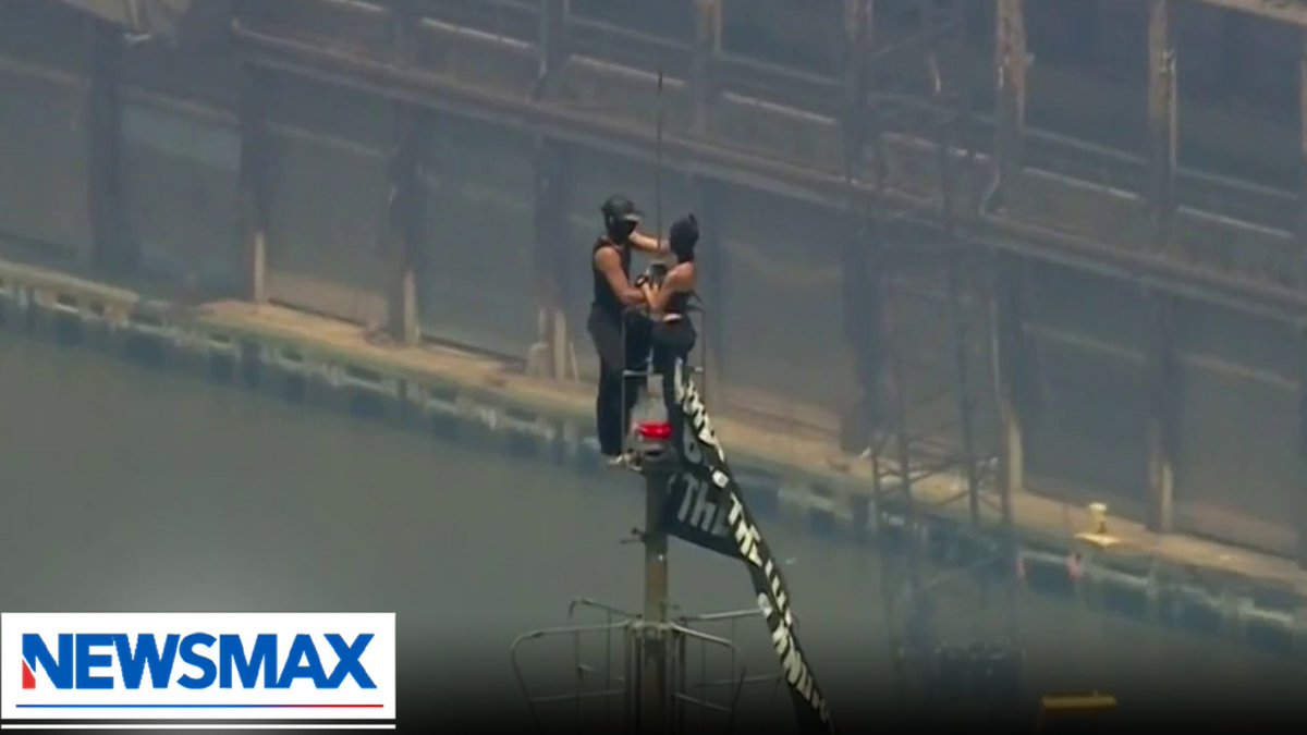 BREAKING: Two masked individuals have climbed to the top of NYC’s Empire State Building and unfurled a banner reading, “When the power of love beats the love of power, the world knows peace.”