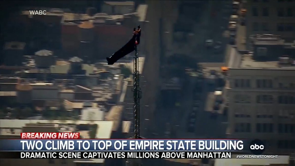 In a brazen stunt, a daredevil couple scaled New York's Empire State Building to unfurl a pro-peace banner and take selfies. One of the climbers then appeared to propose. Aaron Katersky reports as body camera video shows officers climbing to arrest them.