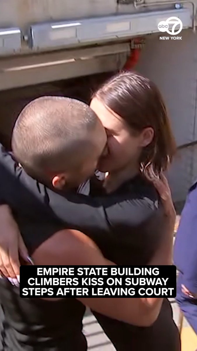 The couple that got engaged after climbing the Empire State Building spire on Wednesday shared a kiss on the subway steps after they left court on Thursday. More: