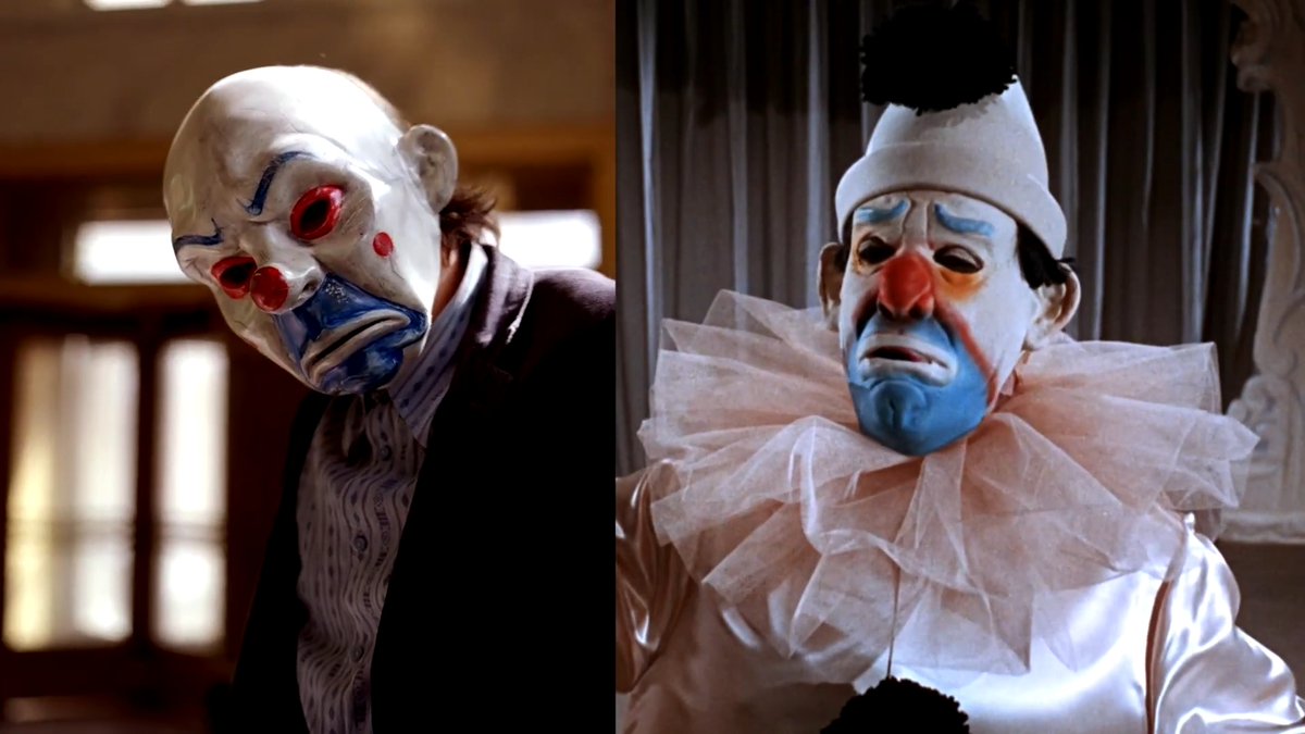 The clown mask Heath Ledger wears in the opening of Christopher Nolan's The Dark Knight (2008) was designed as a direct homage to Cesar Romero’s Pagliacci-style mask from his first Joker appearance in the 1966 Batman TV series.