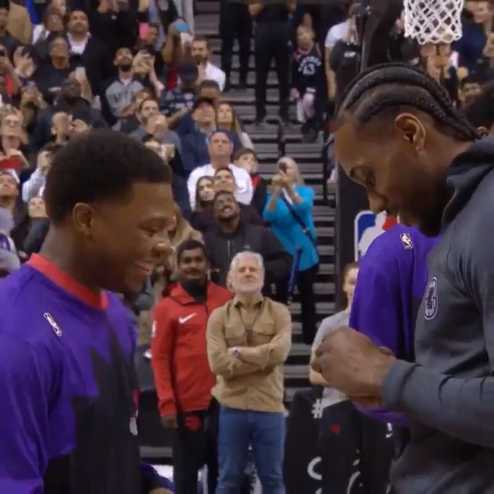 Kyle Lowry giving Kawhi Leonard his 2019 championship ring and now returning, seeing Lowry's 7 go up to the rafters...