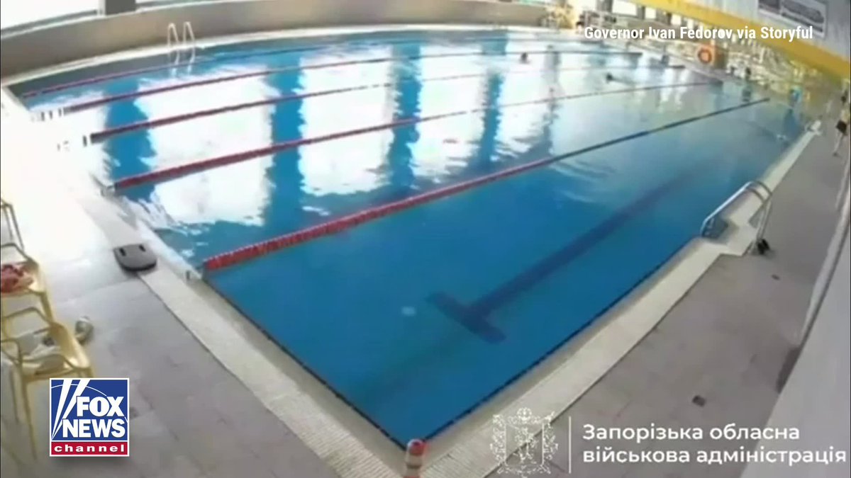 A Russian missile slammed into an indoor swimming pool in Zaporizhzhia, Ukraine, while people were swimming inside. The strike blew a hole through the roof, filling the building with dust and smoke as swimmers scrambled for safety. Ukrainian officials said at least seven people were injured in a series of missile attacks across the city, though it was not immediately clear whether anyone inside the pool was among the wounded. Officials said other Russian strikes also hit a beauty salon, a food warehouse and a residential home.