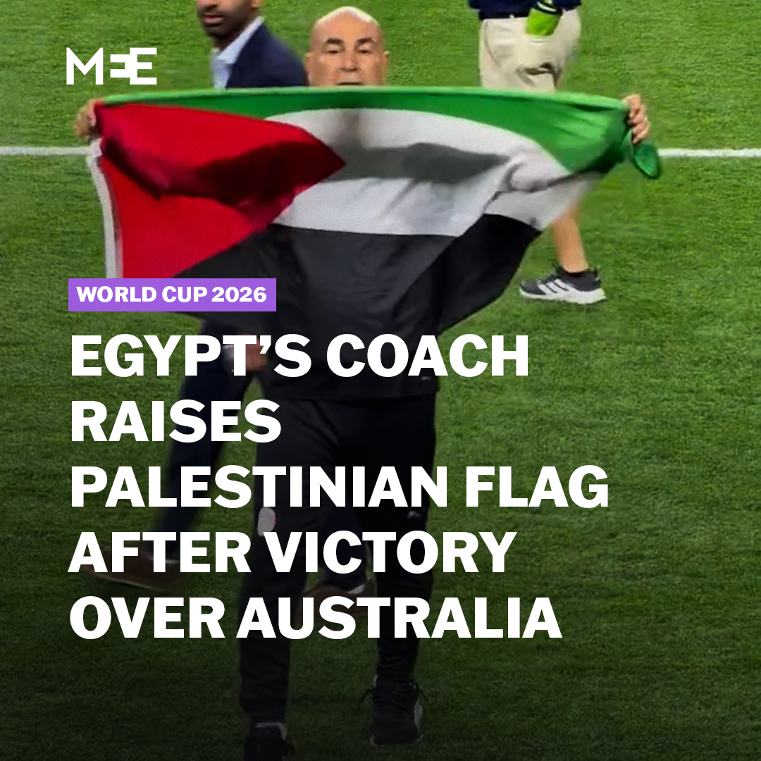 Egypt’s head coach Hossam Hassan holds up the Palestinian flag after the national football team’s historic win over Australia in the 2026 World Cup. Egypt triumphed over Australia, winning 4-2 in a penalty shootout and eliminating the Socceroos from the tournament
