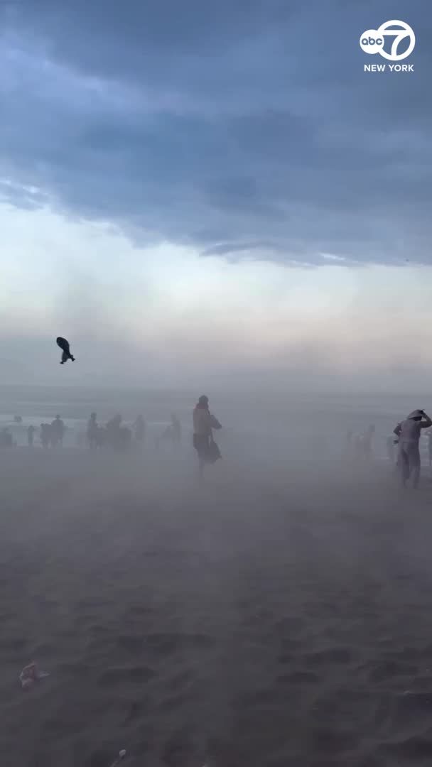 Visitors to Brooklyn’s Coney Island and Brighton Beach rushed to pack up and evacuate as intense wind caused a sandstorm on July 3. Video shows limited visibility as the wind whipped up sand and debris around fellow beachgoers.