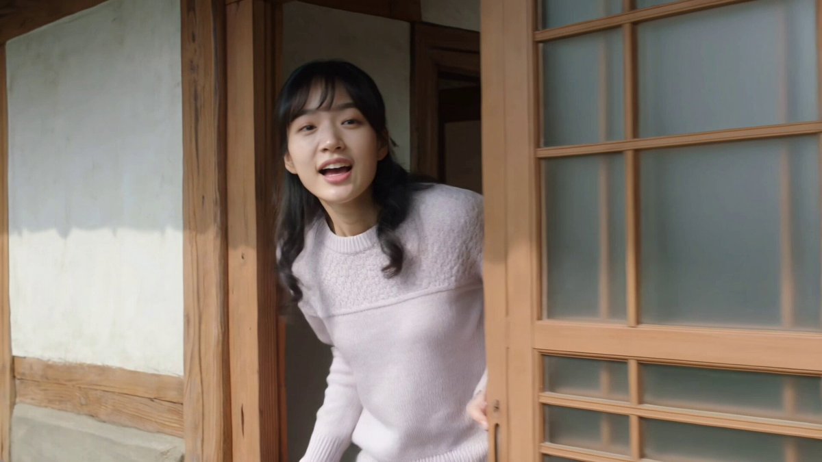 Made this short clip with Kling 3.0 Turbo on Kling App Prompt :- Main Subject: Young Korean woman, early 20s, soft knit sweater, hair in loose waves, warm affectionate expression, natural gentle demeanor. Location : Traditional Korean home courtyard, early afternoon. Wooden sliding doors, small garden, clay pots, stone pathway, potted chili plants drying in sun. No modern elements visible. Visual Style : Warm intimate realistic documentary tone, nostalgic family feeling, soft natural light. Camera Style : Early 2000s camcorder, handheld close framing, gentle refocusing, warm indoor-outdoor color balance, soft grain. No stabilization. Timeline (15 sec, each slot = 2 compressed beats): 00:00–00:03 → She steps into the courtyard, then calls out "할머니, 저 왔어요!" ("Grandma, I'm here!"). 00:03–00:06 → She kneels by the chili plants, then touches the leaves gently, smiling. 00:06–00:09 → She picks up a small clay pot, then examines it curiously. 00:09–00:12 → She turns to the camera saying "여기 진짜 오랜만이다" ("It's been really long since I've been here"), then smiles softly. 00:12–00:15 → She walks toward the sliding door, then looks back once before entering as it fades. Audio : Wind chimes, birds, faint kitchen sounds from inside, footsteps on stone. Her dialogue as noted above. No music. Goal: A tender family homecoming moment nostalgic, warm, sincere.