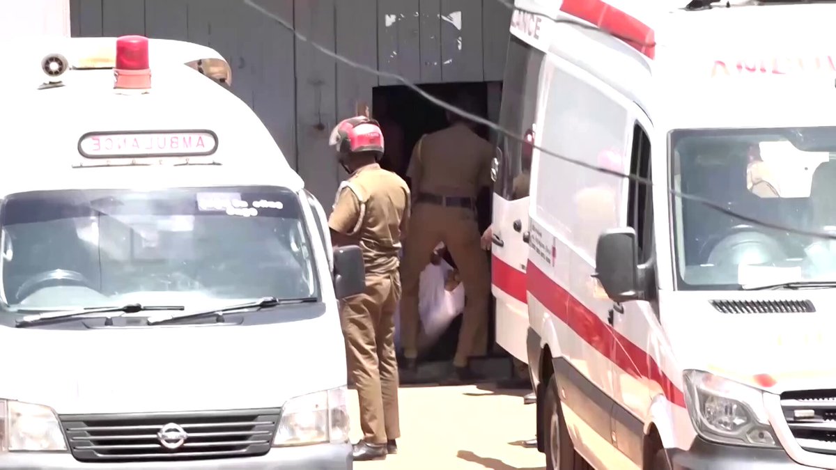 Body bags were removed from a prison in Sri Lanka after clashes between two groups of inmates killed at least 25 people and injured about 100 others