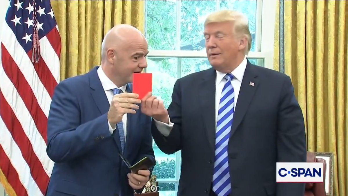 Aug. 28, 2018: FIFA President Gianni Infantino shows President Trump yellow and red cards in the Oval Office.