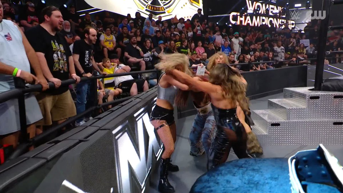 It is COMPLETE CHAOS outside the ring!! 😳