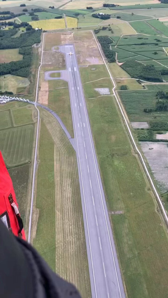 Bungee jumpers film a DHL Boeing 757-200 freighter taking off below their hot air balloon at Örebro Airport, Sweden. 📹: bungysthlm (IG)