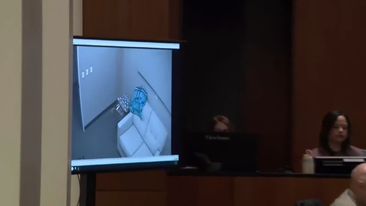 Charlie Kirk murder suspect surrenders to police in new video shown in court.