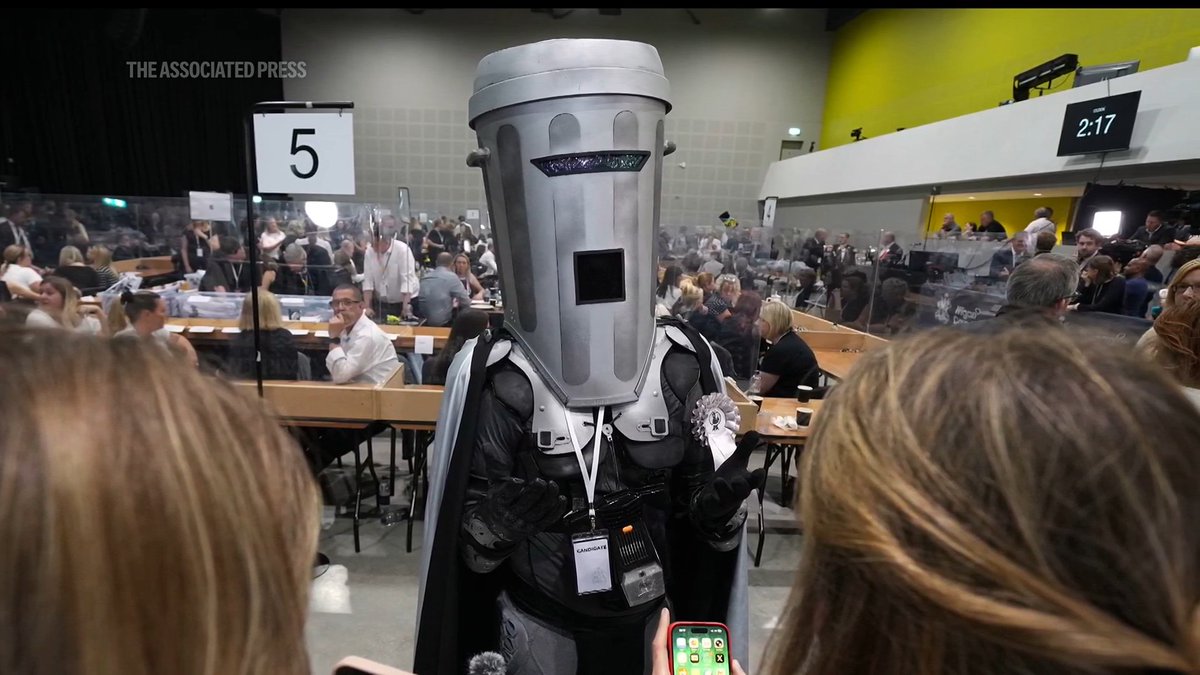 Count Binface, a comedian with a trash can on his head, is set to be the main challenger to run against Nigel Farage after the Reform UK leader said he'll quit as lawmaker and seek reelection to clear his name over donation allegations.