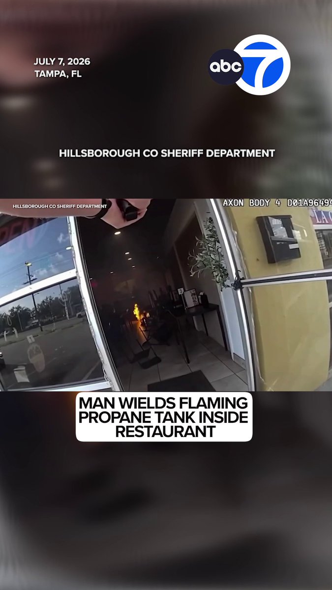 A shocking video captures a man carrying a flaming propane tank inside a Florida restaurant. He was later taken into custody and now faces multiple charges.