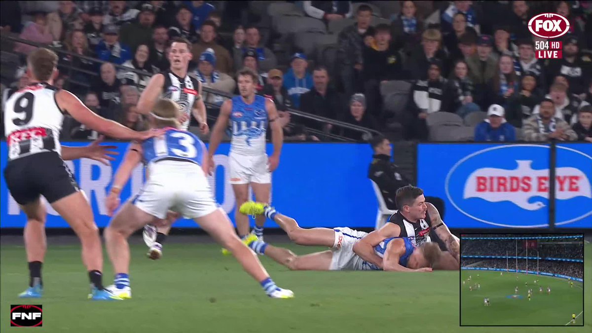Tom Blamires has gone down to North Melbourne's changerooms for a HIA (Head Injury Assessment) after this incident. 📺 Watch #AFLPiesNorth on Ch.504 or stream on Kayo: ✍️ BLOG 🔢 MATCH CENTRE