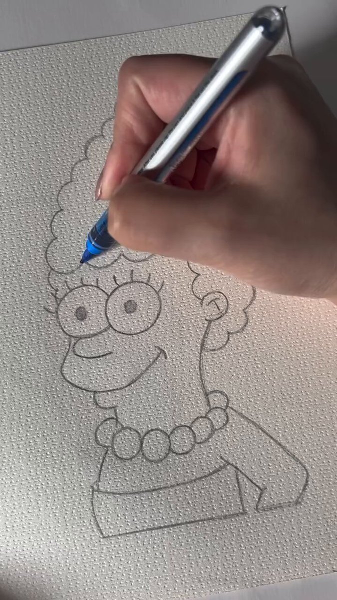 Coloring the animated series character "Marge Simpson" 🎨