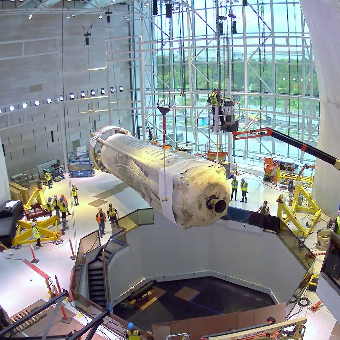 A Blue Origin New Shepard rocket just went on display in our new "RTX Living in the Space Age” exhibition! Check out this behind-the-scenes look at how we installed the 50-foot-tall and nearly 36-ton rocket.