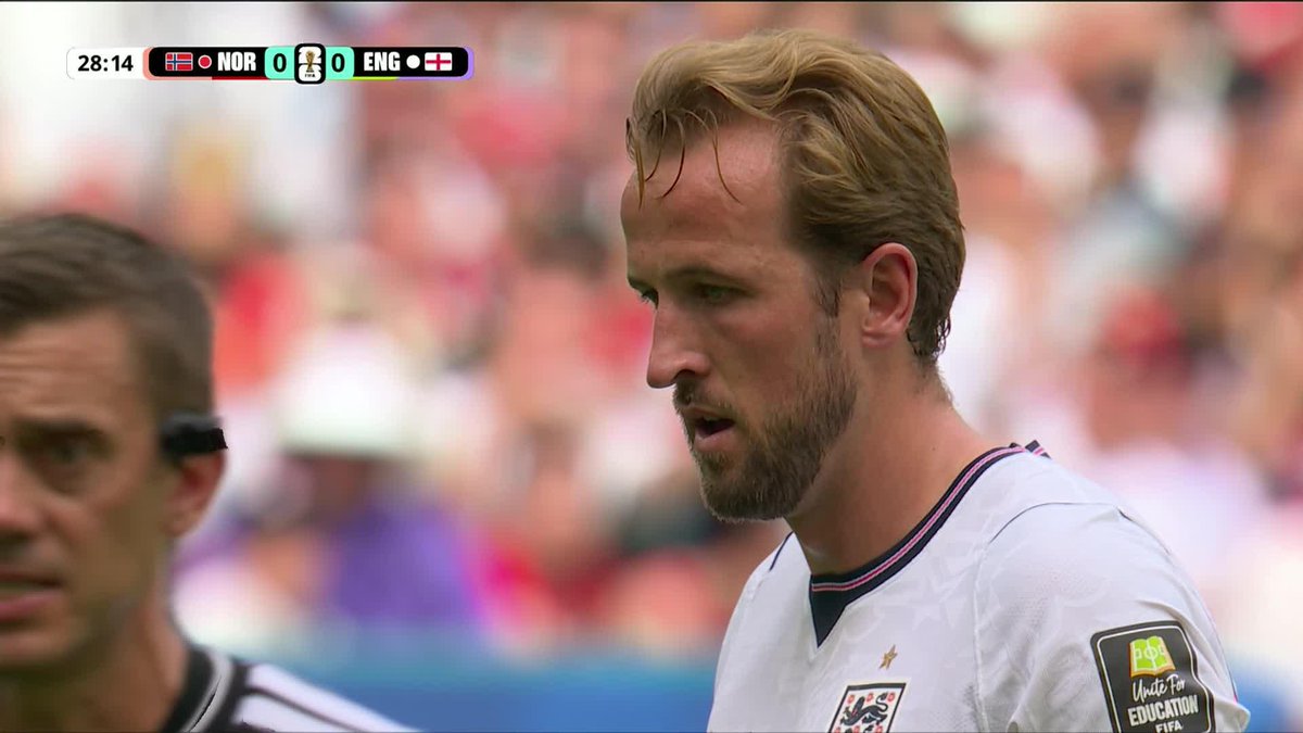 Harry Kane strikes the free kick but it rises over the net.