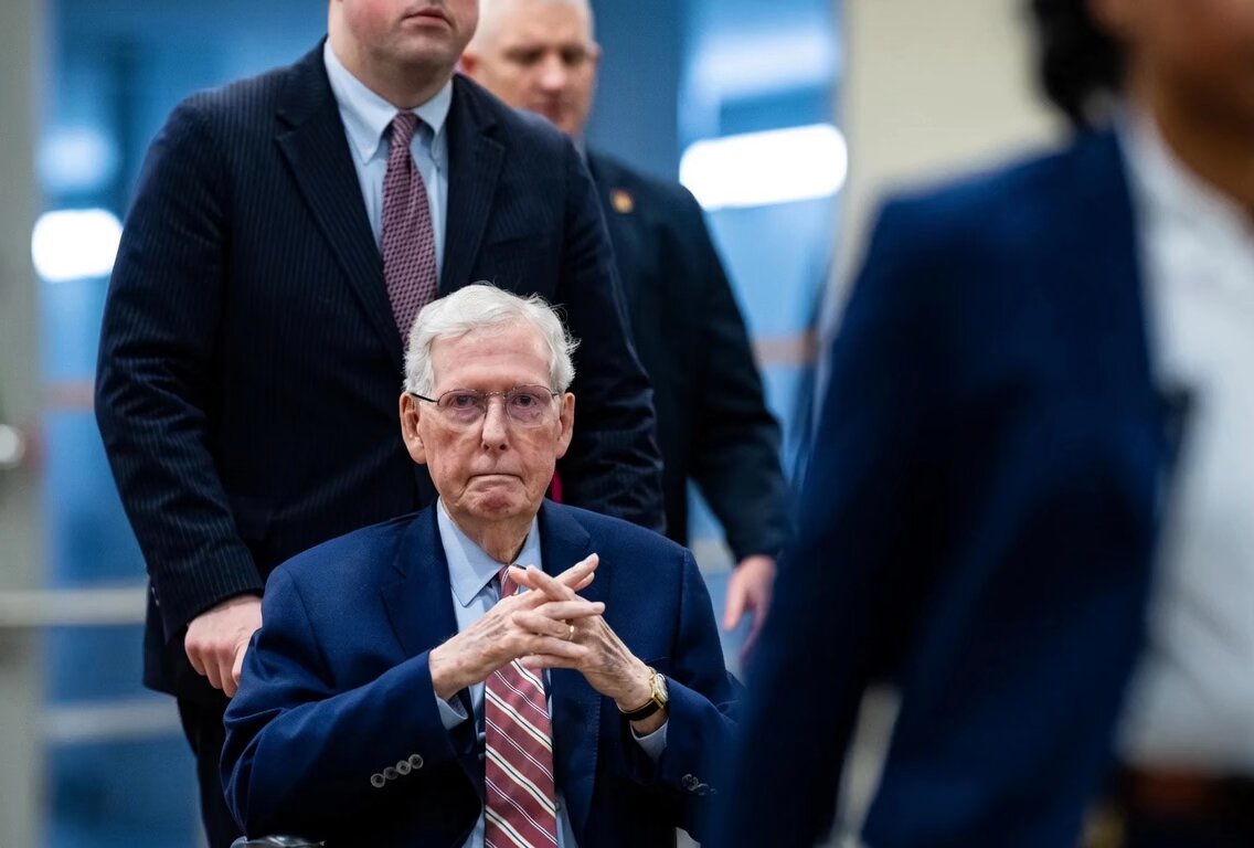 Where Is Mitch McConnell? Renewed Concerns After Graham’s Passing Mitch McConnell, the longtime Senate Republican leader, has been largely out of public view since his reported cardiac emergency in mid-June. This AI video depicts him seated in a wheelchair, highlighting the serious concerns around his health at age 84 — especially with the recent passing of Senator Lindsey Graham. His office maintains he’s recovering and handling Senate business remotely, but the lack of recent public appearances continues to fuel speculation. Prayers for McConnell and his family. Transparency matters for leaders in critical roles. Where is he now — and do you think we need stronger term limits and health disclosure rules in Congress? What’s your take?