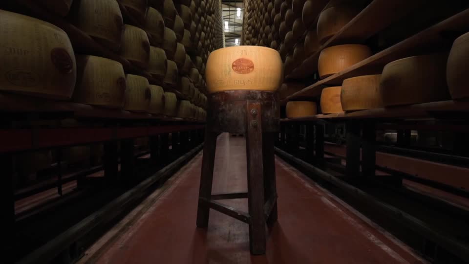Heatwaves threaten Parmigiano Reggiano production in Italy, affecting milk quality and storage costs for over 500,000 wheels of cheese worth more than $340 million