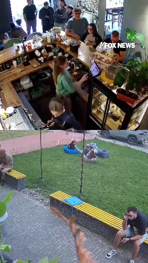 Security cameras capture the moment civilians in Ukraine's Sumy scramble for cover as a Russian glide bomb explodes nearby, blowing out the windows of a local coffee shop. Additional video shows people lying on the ground outside, trying to shield themselves as the blasts tear through the area. Ukrainian officials say two Russian glide bombs struck a crowded part of the city Saturday, killing five people, including a child, injuring 30 others, and damaging buses, cars, and nearby apartment buildings.