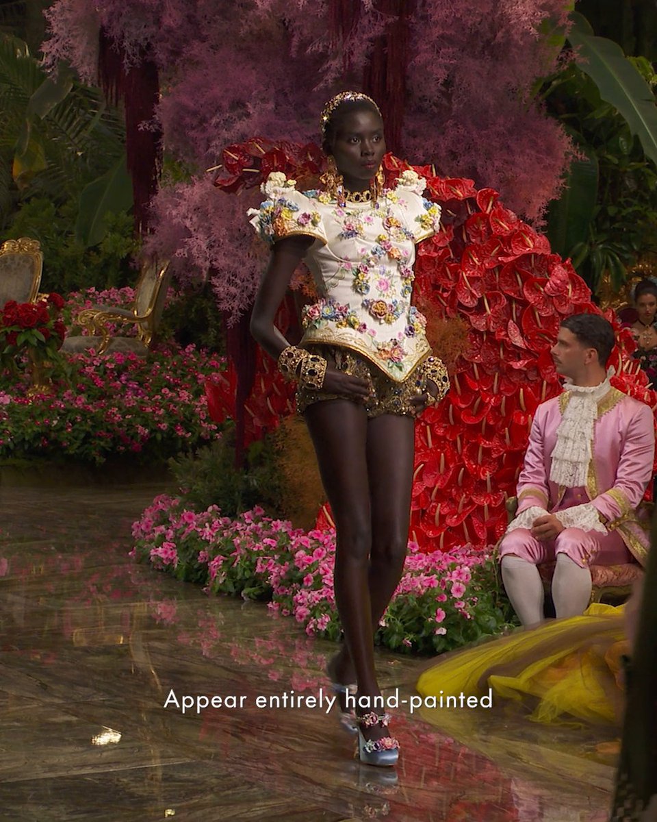 On the occasion of #DGAltaModa, the opulence of Capodimonte porcelain transforms into fabric, echoing the atmosphere of Radicepura Horticultural Park. Inspired by the refined beauty of Capodimonte porcelain, hand-painted golden scrolls and delicate three-dimensional garlands embellish duchesse and gazar. The enchantment reaches its pinnacle in a statement creation, adorned with authentic porcelain elements shaped according to the time-honoured techniques of the manufacturing tradition, a tribute to the artisanal excellence of this noble art. Rewatch the show at #DolceGabbana #DGFattoAMano #MadeInItaly