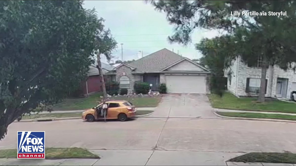 A suspect fleeing police crashed into a DoorDash delivery driver before jumping over a fence and running through a Houston neighborhood. Home security video shows the suspect's vehicle striking the driver after she stepped out of her car. Despite being knocked to the ground, she gathered herself and finished the delivery before police tracked down the suspect. Authorities later arrested Torrance Whitaker after a K-9 helped locate him. He is charged with aggravated assault in connection with the incident.