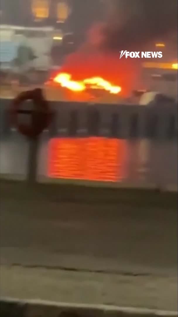 A massive blaze erupts at Iran's Kish Island as the U.S. military announces another round of strikes. Video circulating shows thick flames and smoke rising from the port area, while Iranian media reports explosions on Kish Island, Qeshm Island, Abu Musa Island and in Bandar Abbas. The strikes mark the third consecutive night of U.S. military action after President Donald Trump reinstated a blockade of Iranian shipping and proposed a 20% fee to protect vessels passing through the Strait of Hormuz.