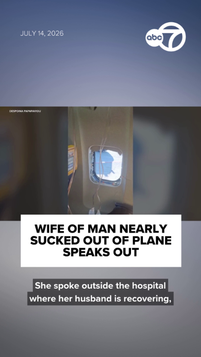 A woman whose husband was nearly sucked out of a Ryanair flight in mid-air says she and other passengers desperately tried to hold on to him while half of his body was outside the window. Speaking outside the hospital where her husband is recovering, Svetlana Maksimovic said she reacted immediately and grabbed his legs. "I thought: 'If we die, we die together.’ It was horrible," she said.
