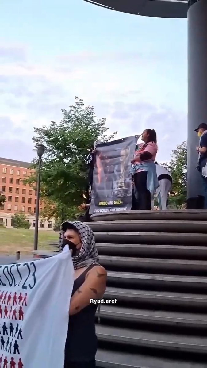 In Germany 🇩🇪, Free Palestine activists stage a small protest conveniently outside a World Cup watch party. It doesn't look like they're convincing anyone.