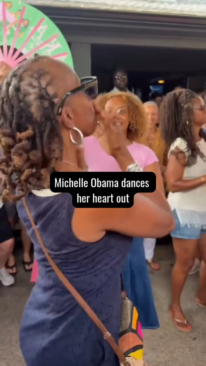 Michelle Obama showed off her moves, joining a birthday celebration in Martha's Vineyard and hitting the wobble 💃🎉 The former first lady, 62, looked gorgeous and glowing in a backless shirt, braids and statement sunnies, enjoying some well deserved time off 😎 📽️ : vineyard_icon #MichelleObama