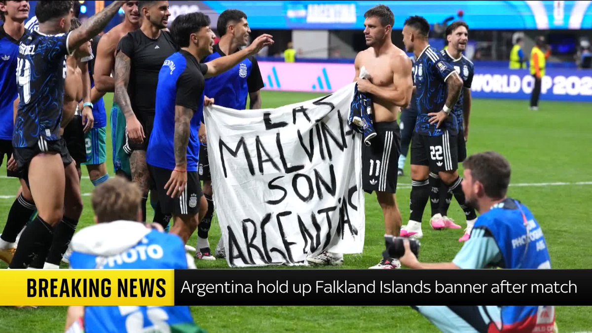 Argentina players take banner from their fans and bring it onto the pitch, it read: "The Falkland Islands are Argentinian." The moment happened after the team beat England in the World Cup semi-finals. Read more:
