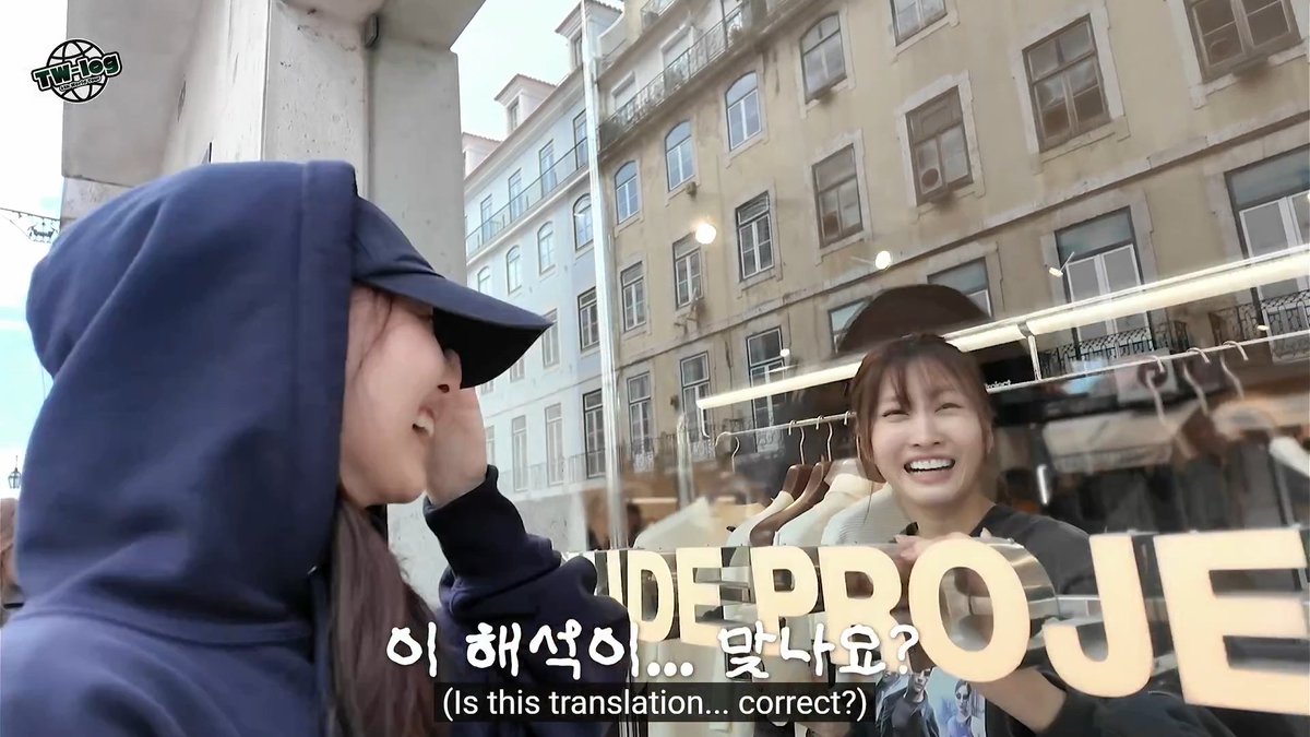 Nayeon and Momo somehow communicating perfectly through the shop window 😭