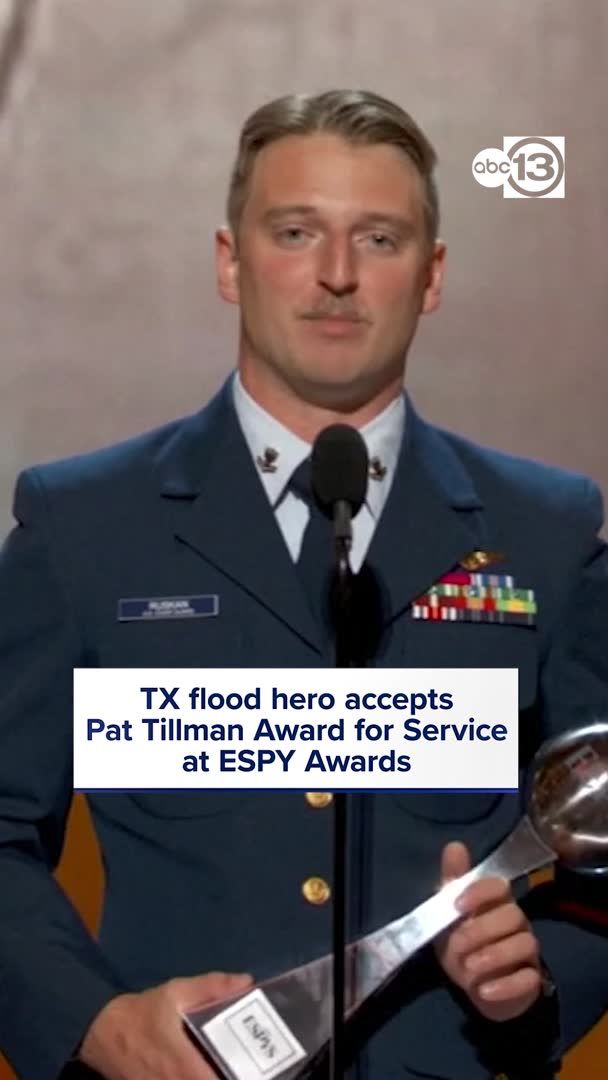 Coast Guard's Scott Ruskan, who's first-ever rescue mission helped save more than 100 lives in the flash floods at Camp Mystic in Central Texas, accepts the Pat Tillman Award for service at the ESPY Awards.
