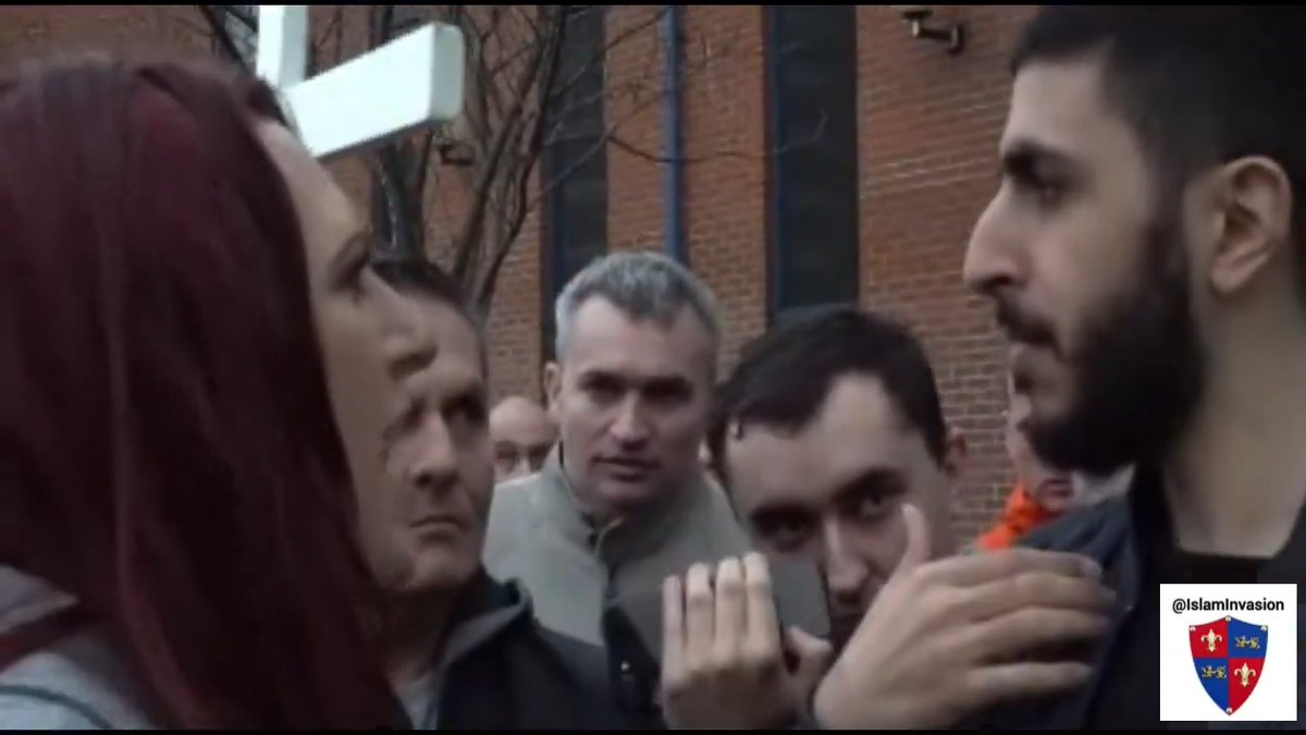 "Christians aren't to be messed with!" Cross in hand, she stares them down: "You are my enemy!" Time to stand up and show some real conviction! Great job, Jayda Fransen