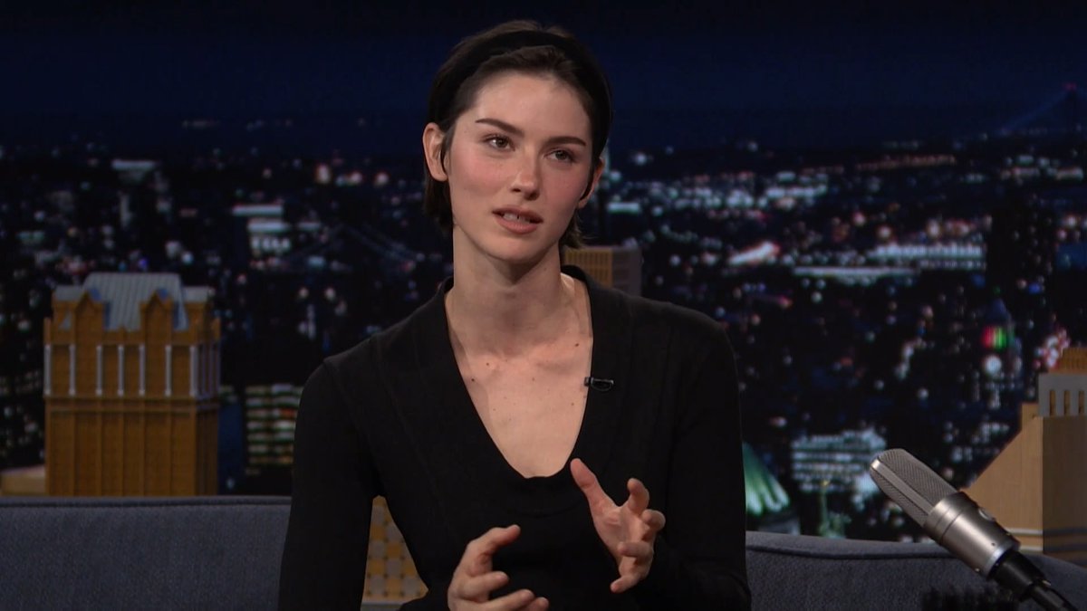 Gracie Abrams recalls feeling existential after hearing 'That’s So True' playing in a Connecticut smoke shop bathroom after filming the dumpster fire scenes for 'Look at My Life.'