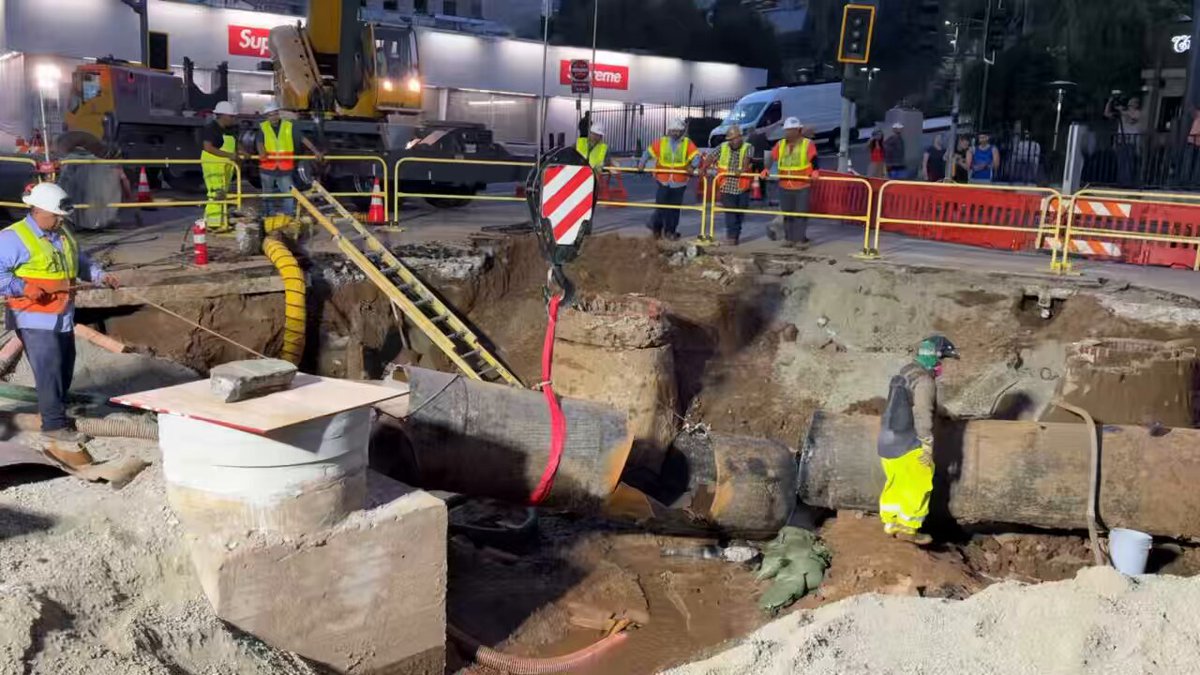 The 25-foot segment of pipe that has been cut from the ruptured trunk line in West Hollywood has been lifted and will soon be hauled away. Crews are making progress on the repair and will keep working through the night and until the work is complete.