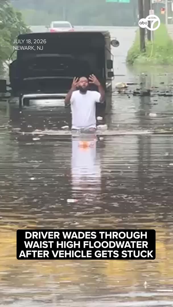 A man was seen wading through waist-high water after storms brought flooding to Newark and across much of the Tri-State area. More: