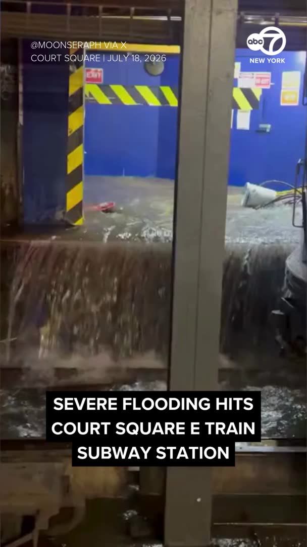 Floodwater drenches the E Train subway station at Court Square, amid major storms in the area.