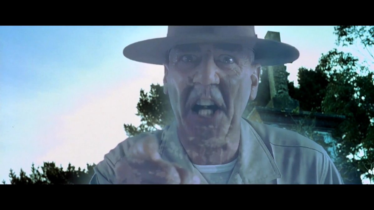 Incredibly, R. Lee Ermey wasn't the first choice to parody himself in The Frighteners, which is 30 years old today. In one of the best callbacks in cinema, R. Lee Ermey playfully parodies his legendary Gunnery Sergeant Hartman from Full Metal Jacket. But it only happened because Peter Jackson couldn't find anyone good enough to emulate the role Ermey created. Jackson held auditions to find someone who could imitate Ermey’s raw intensity, but no one could. Realising he'd never find anyone good enough, Jackson went to the source and contacted Ermey directly, who immediately agreed to fly out to New Zealand. Jackson made the smart move and allowed Ermey to improvise around the basic plot points and deliver his signature Full Metal Jacket vibe, adding dialogue like, "Get back in the goddamn ground, you unorganised grab-asstic gob of teleplasmic shit!". At the same time, Jackson mirrored Kubrick's framing, giving the audience an up-close-and-personal nostalgia hit. What makes it so amazing is that it weaponises the psychological abuse, which was genuinely terrifying in Kubrick's war movie, abuse that drives a man to end his own life, and transforms it into a full-on comedic performance. Yet it's delivered in exactly the same fashion. The Frighteners was released nine years after Full Metal Jacket, but Ermey's unforgettable performance was so iconic that the parody is instantly recognisable the second he appears on screen. There is absolutely nothing subtle about it, and it hit the perfect note. What this story proves more than anything is that there was no one quite like R. Lee Ermey.