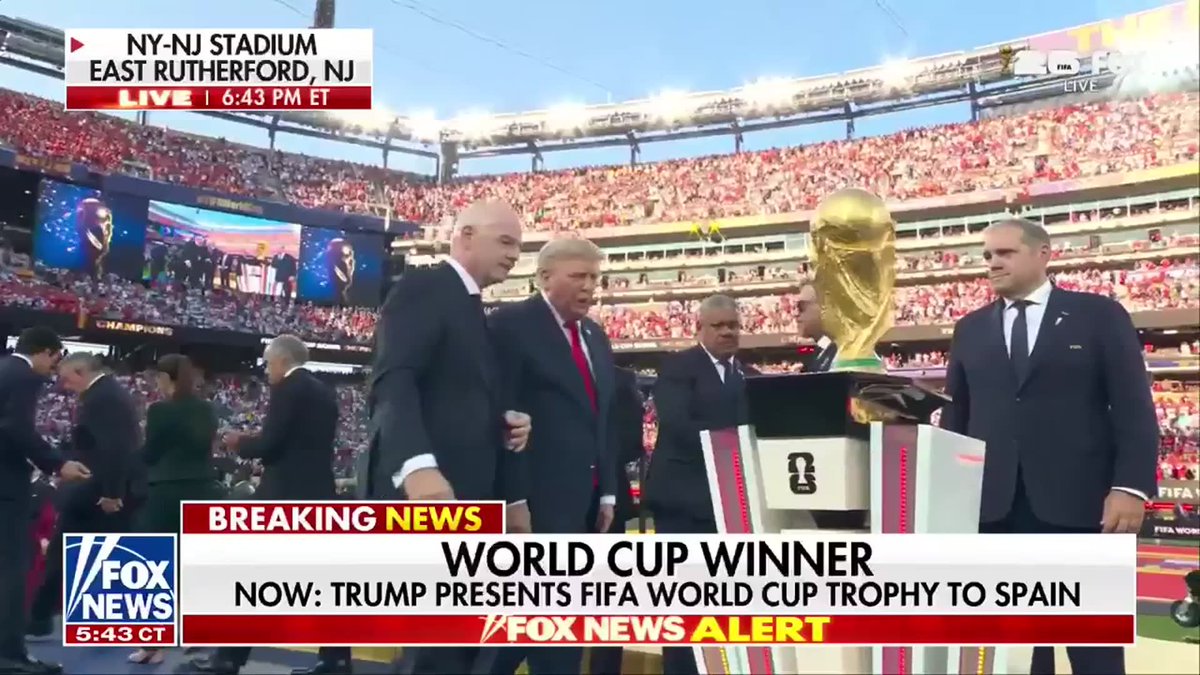 President Trump and FIFA President Gianni Infantino present the FIFA World Cup trophy to Spain after its 1-0 extra-time victory over Argentina in the 2026 World Cup final. Ferran Torres scored the decisive goal in extra time as Spain captured its second men's FIFA World Cup title before the trophy presentation at New York New Jersey Stadium in East Rutherford, New Jersey.