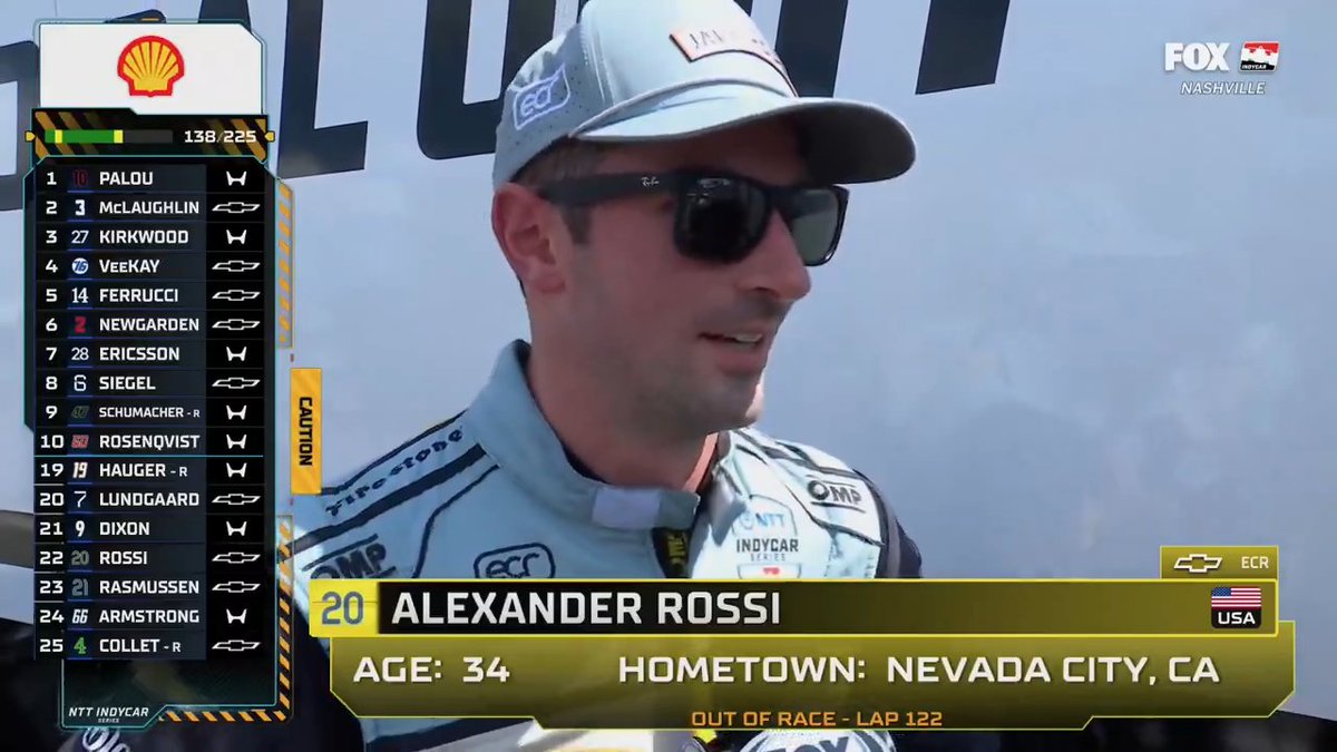 Alexander Rossi talks with Georgia Henneberry after his incident with Scott Dixon.