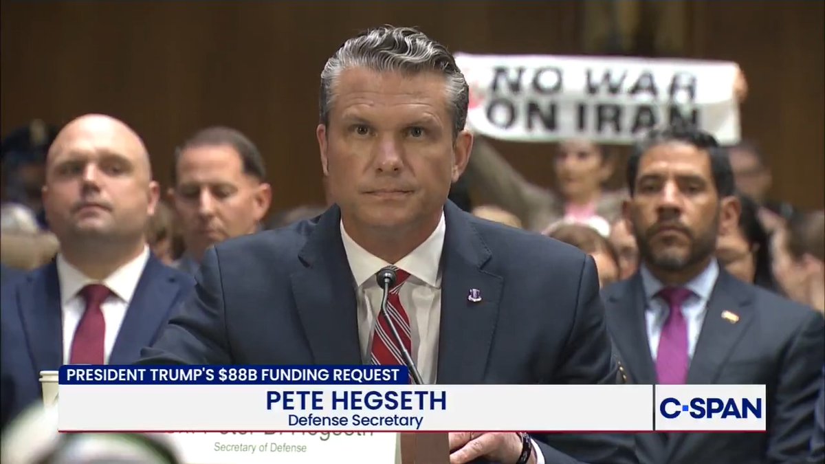 Protestors continuously interrupt Defense Secretary Pete Hegseth during his opening statement: "Stop bombing our children in Iran and Palestine - this is illegal!"